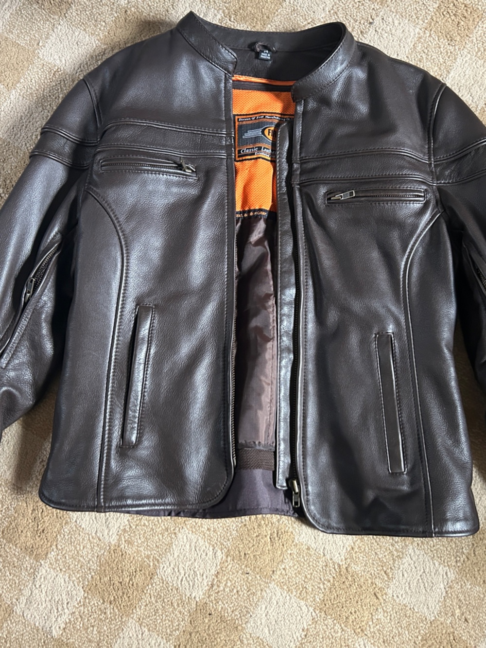 woman’s Dark Brown Leather Motorcycle Jacket with Zip Pockets